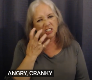 scrunch up your face and with dom hand claw like hand moves towards face