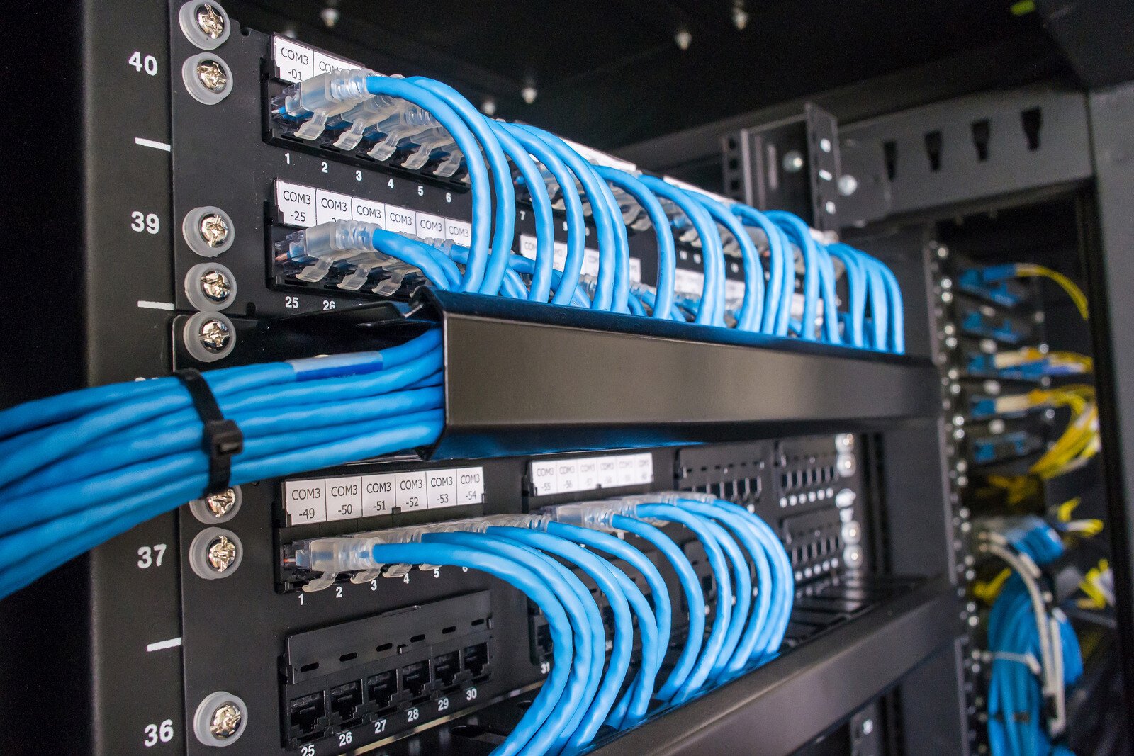 <p>What is this device? Connects to network cables in the wall to help facilitate communications within a localized area. Since switches are expensive and only have so many connections, it's more efficient to buy some of these than lots of switches.</p>