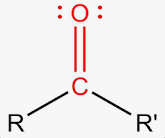 <p>Is a functional group made of a carbon atom atom double-bonded to an oxygen atom (C=O).</p><p>It is important in biology because the oxygen is highly electronegative, which makes the group polar and gives the carbon a slight positive charge.</p><p>This polarity allows the carbonly group to be very reactive and to interact with many other molecules in water-based environments.</p>