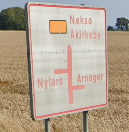 <p>White background with red lettering</p>