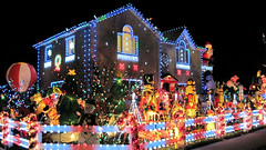 extravagantly bright or showy, typically so as to be tasteless