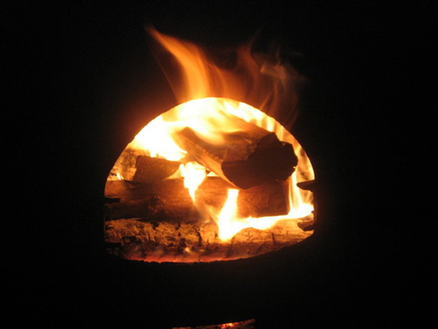 <p>(burning) Releases heat energy and carbon dioxide to atmosphere.</p>