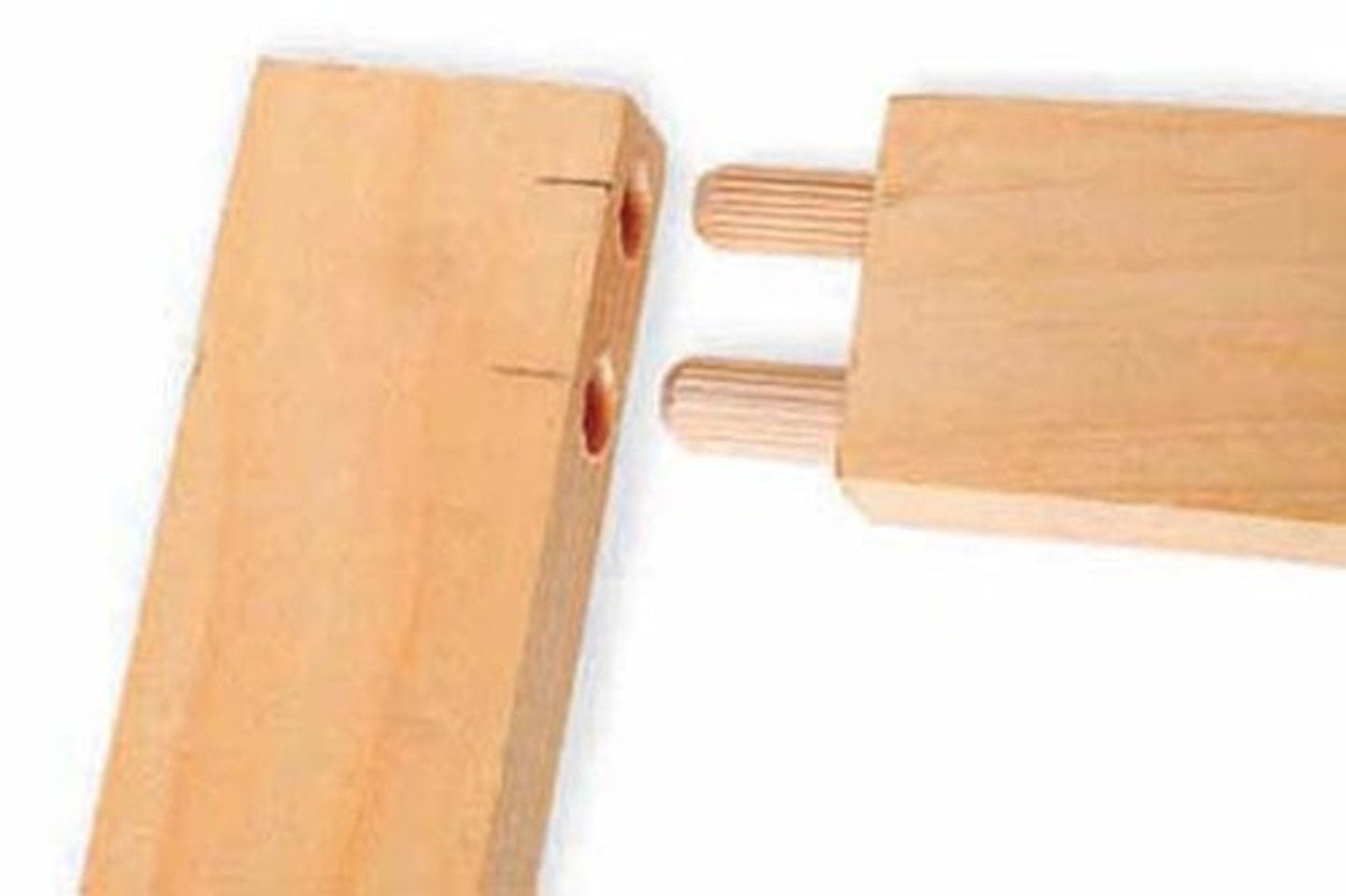 <p>The end of a piece of wood is butted against another piece of wood. This is reinforced with dowel pins. This joint is quick to make with production line machinery and so is a very common joint in factory-made furniture.</p>