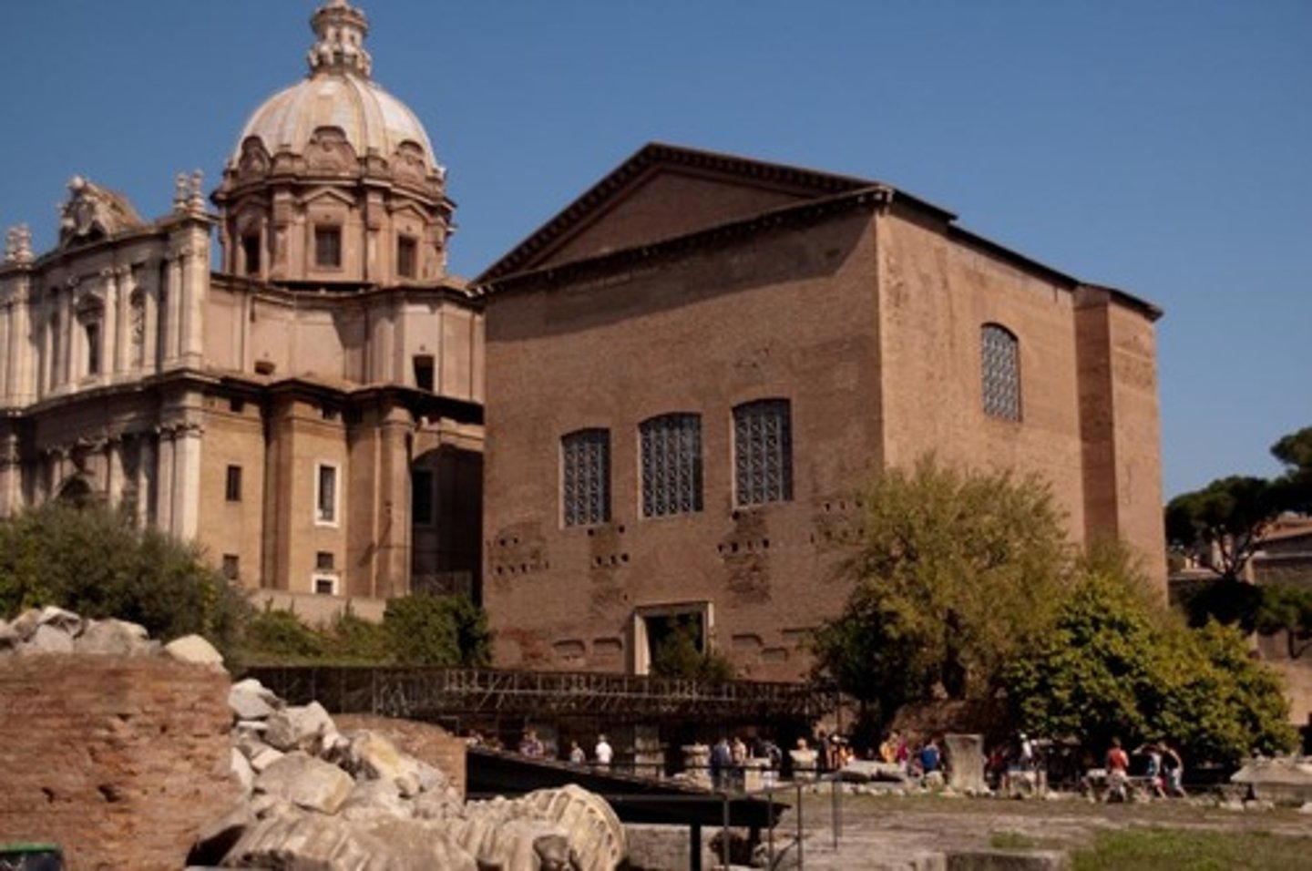 <p>-Reoriented by Caesar toward his forum</p><p>-Site of Senate House</p><p>-Fires and rebuilding</p>