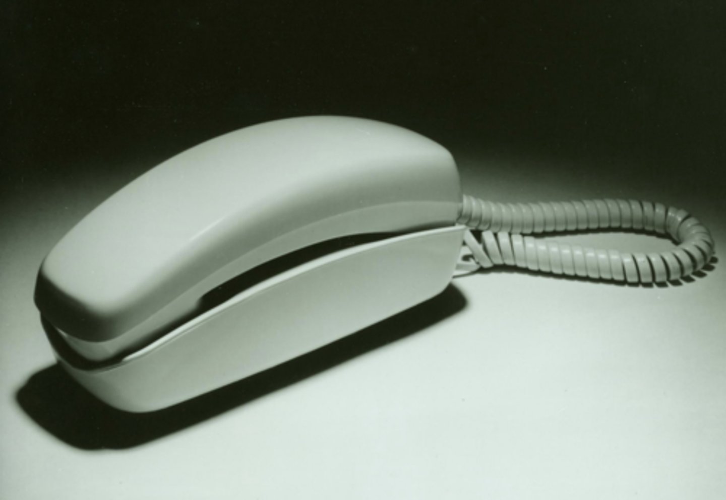 <p>Trimline Dial Touch Telephone 1965<br>Trimline Touch Pad Telephone <br>went from rotary phone to number keys!</p>