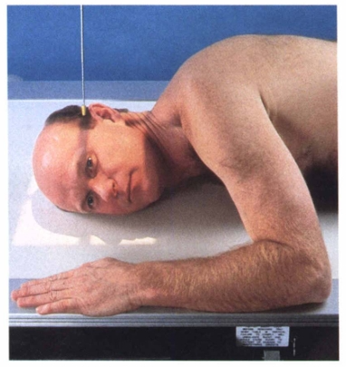 <p>The flexion of the patient’s neck in the lateral projection should position the infraorbitomeatal line (IOML) ____________ to the front edge of the IR and ____________ to the long axis of the IR.</p>