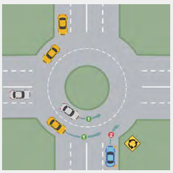 <p>a circular intersection with design features that promote safe and efficient traffic flow</p>