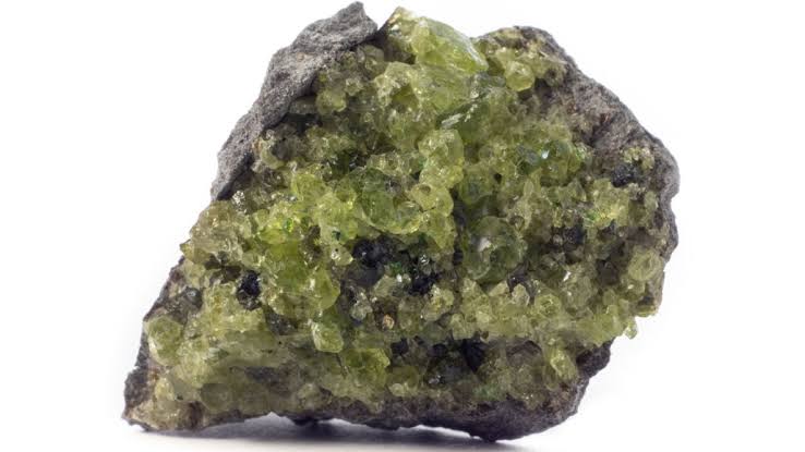 <ul><li><p>Mineral habit - druzy</p></li><li><p>Luster - glassy/vitreous</p></li><li><p>Color - light green</p></li></ul>