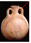 <p>Concentric circles-Heart where handles and neck meet</p>