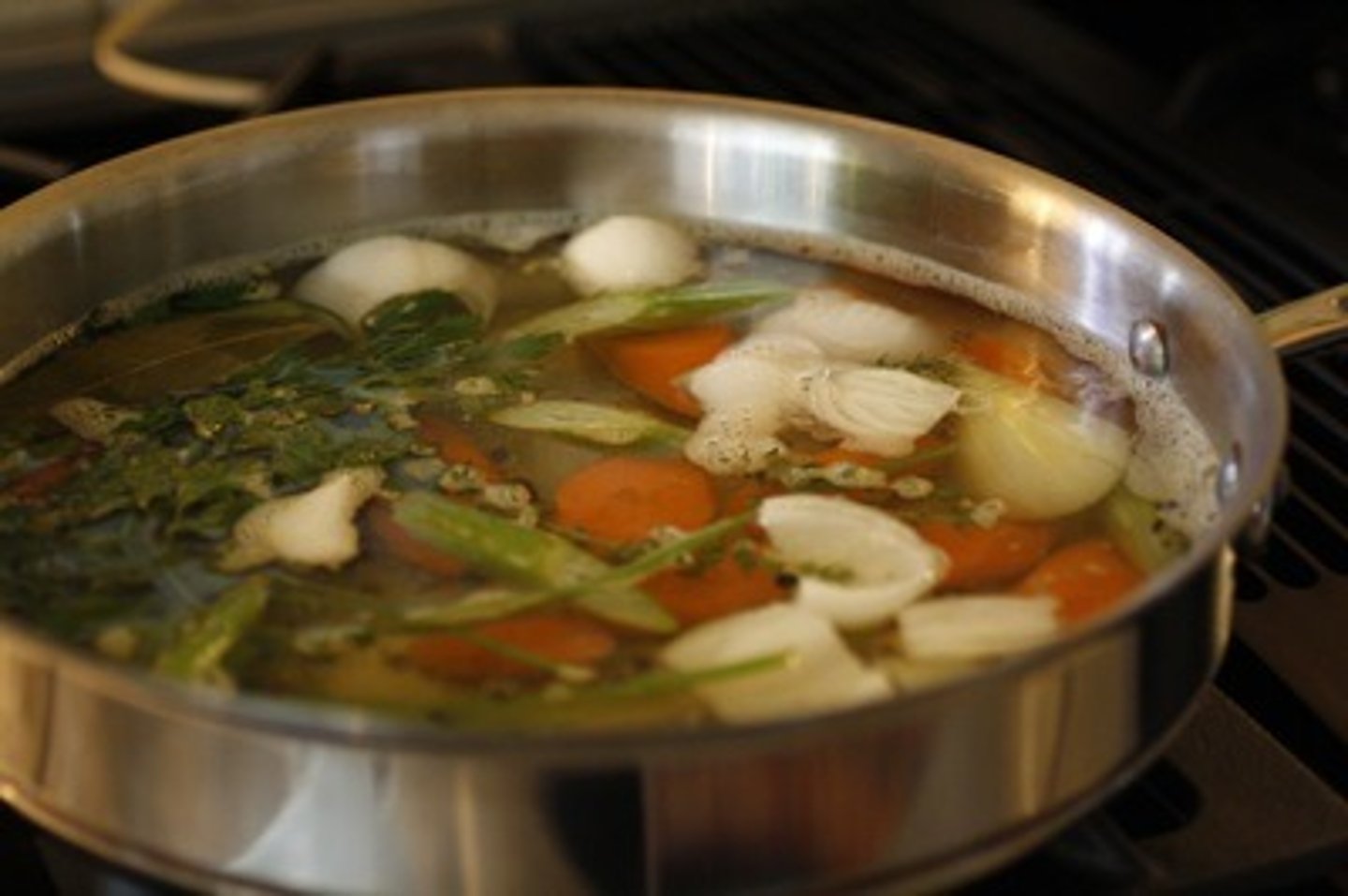 <p>aromatic vegetable broth used for poaching fish or vegetables</p>