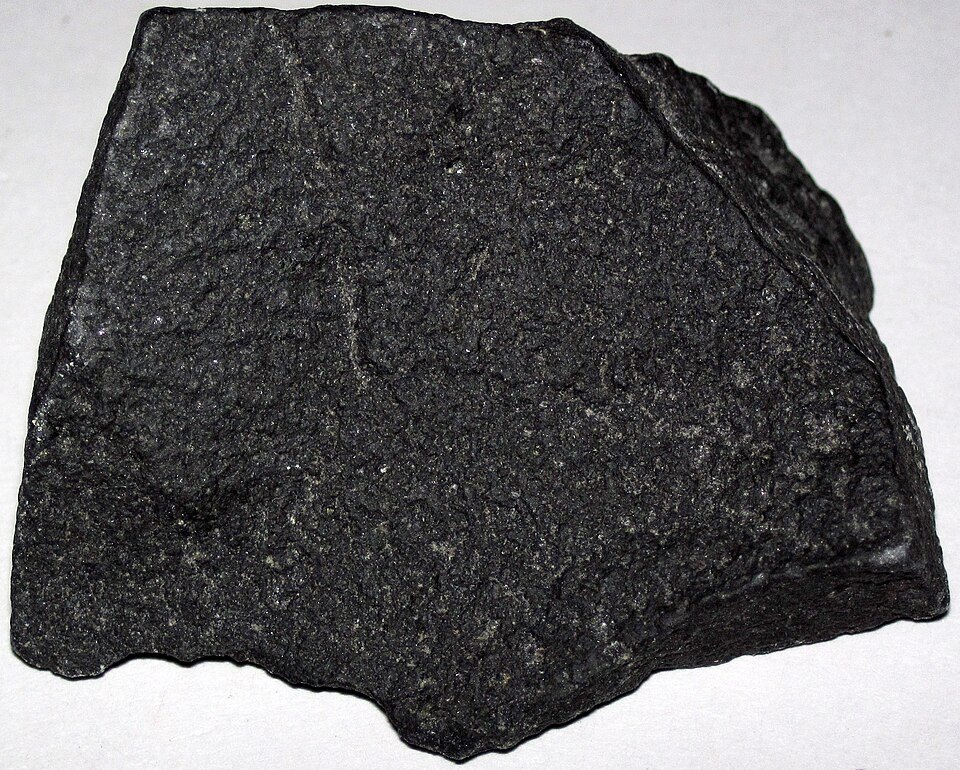 <p>Identify the igneous rock, its texture, and composition</p>