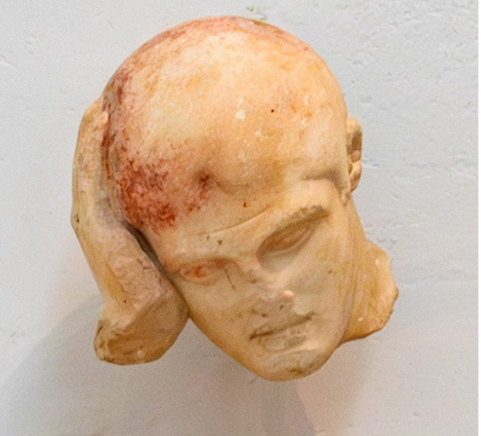 <p>How is detail created in Herakles face? What does the expression suggest? (2 Points)</p>