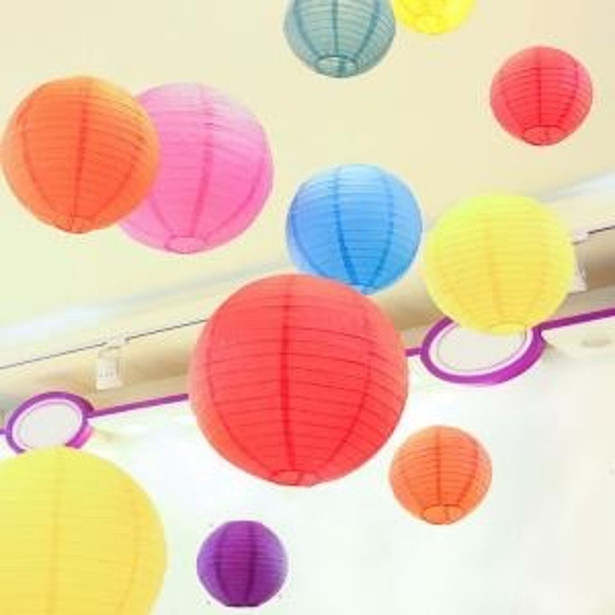 <p>Lanterns - Colorful, paper lanterns that adorn the fair</p>