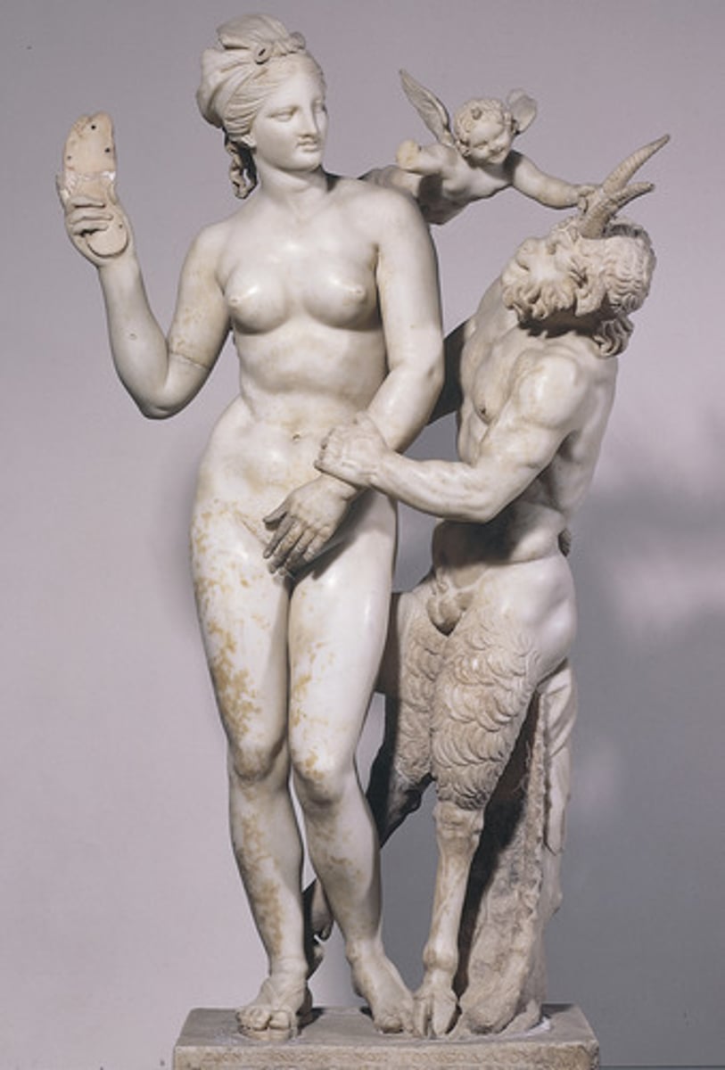 <p>- Pan accosting Aphrodite with Eros pushing Pan away</p><p>- Aphrodite holding her slipper ready to slap Pan</p><p>- lighthearted &amp; playful scene; playfulness and joyous emotion encapsulated by this sculpture make it distinctively Hellenistic</p>