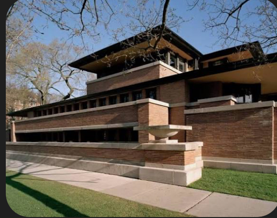 <p><span><span>Strong horizontal lines, cantilevered roofs, brick Prairie style</span></span></p>