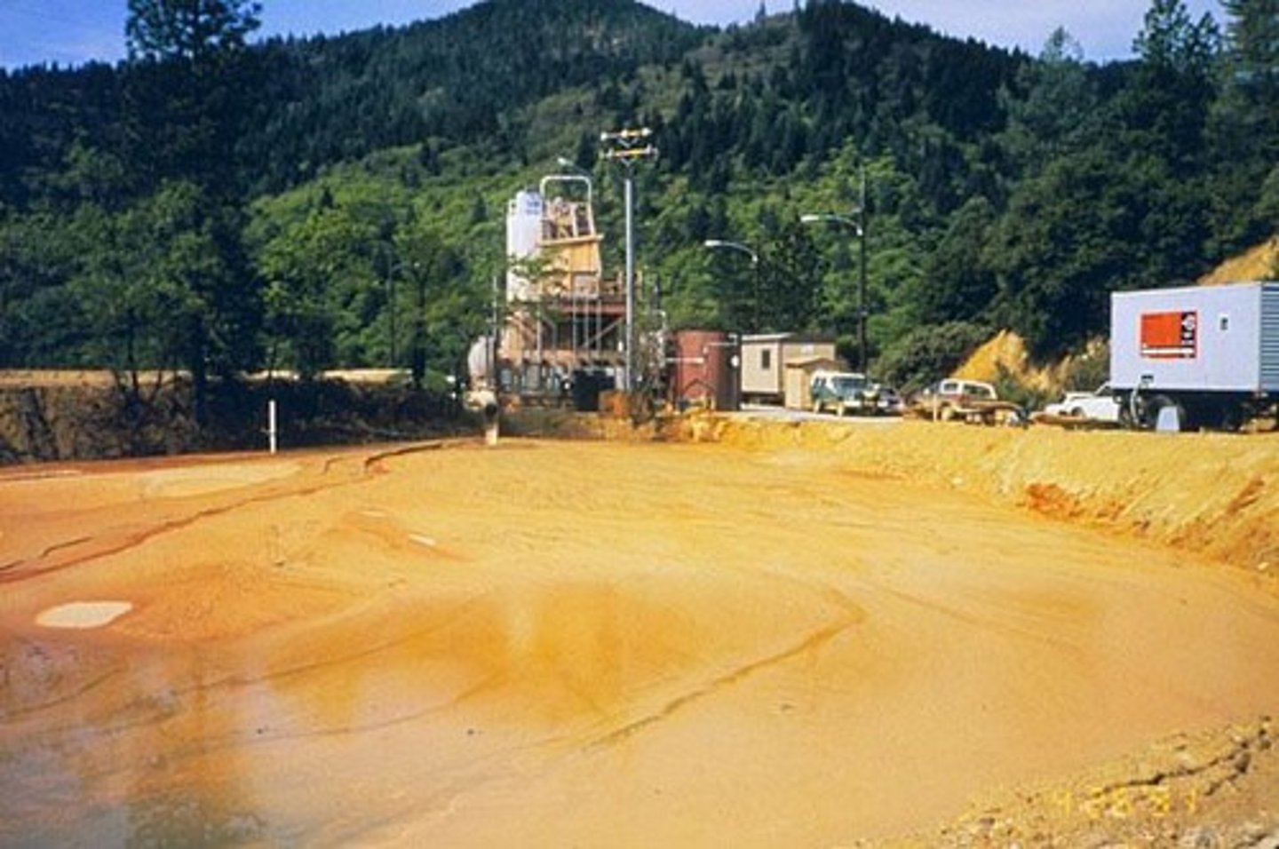 <p>Acidic leachate, normally rich in heavy metals that drains from either tailings or underground mines.</p>
