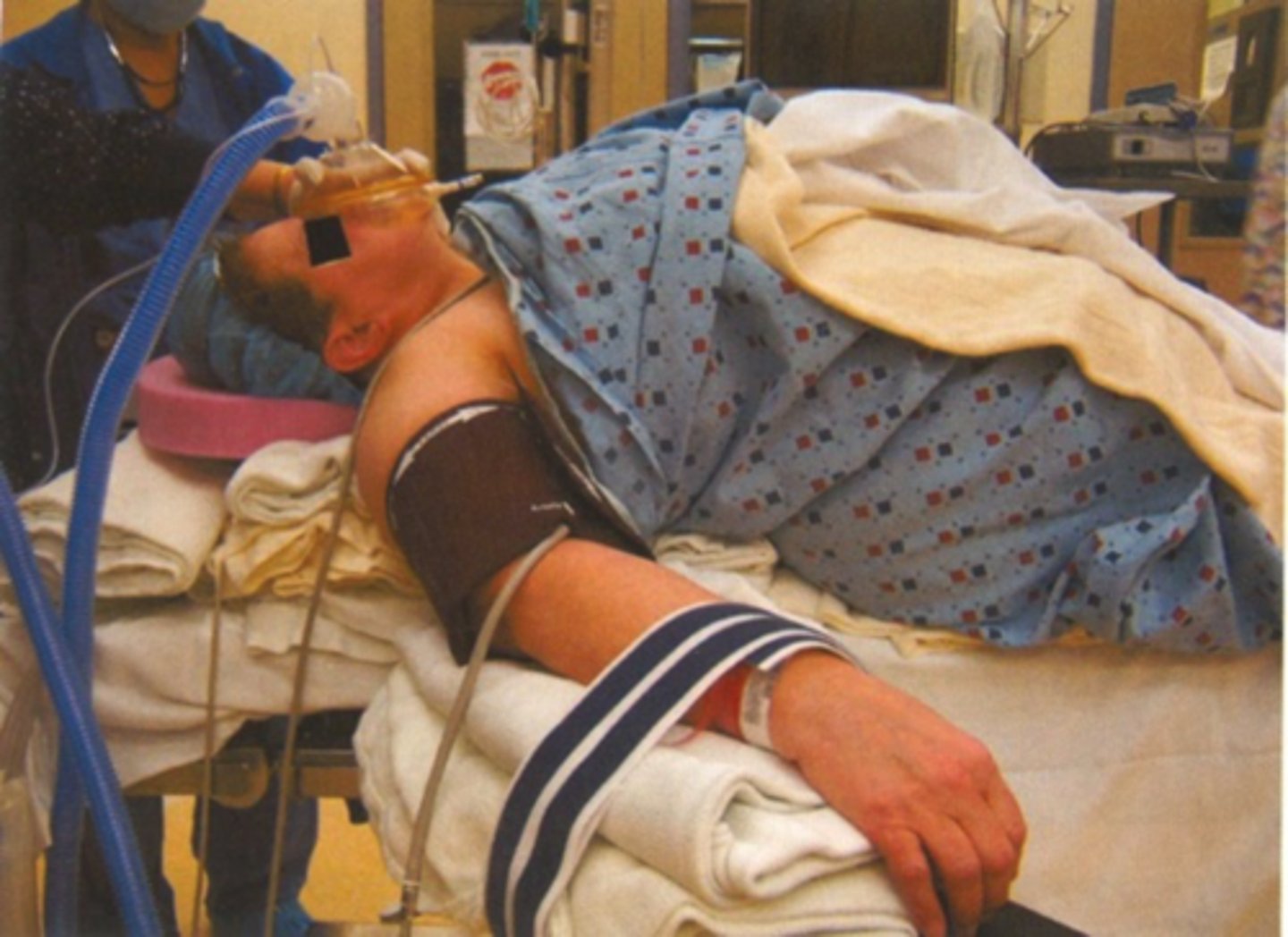 <p>build up/ramp up bed with sheets to allow for neck extension</p>