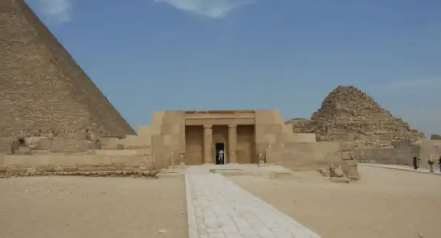 <p>An ancient Egyptian tomb characterized by a flat-roofed structure with sloping sides, often used for the burial of high-status individuals. </p>