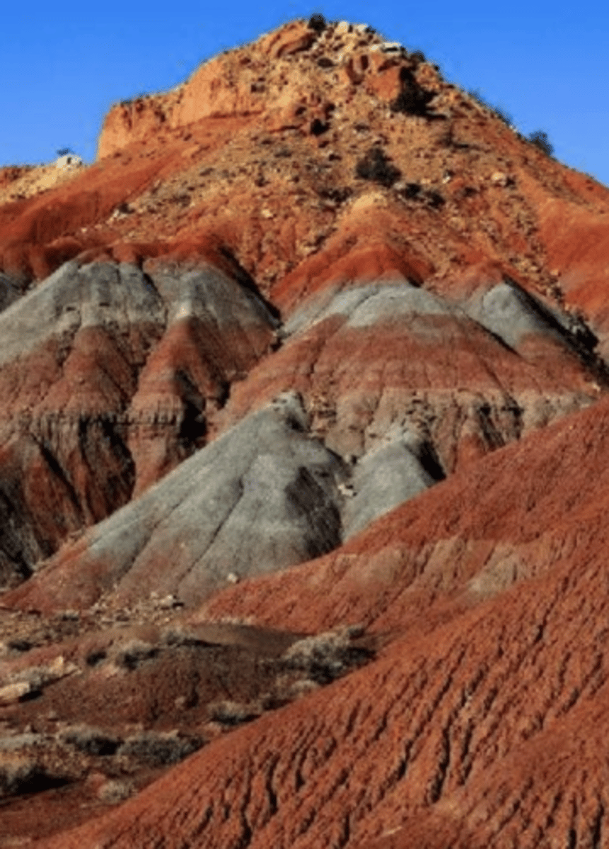 <p>Sedimentary rock deposits that contain oxidized iron, provides evidence that there was oxygen present in the atmosphere when they formed. Therefore, because there are no Red Beds older than 2.2 Gyr, this proves there was little to no oxygen in the atmosphere before then.</p>