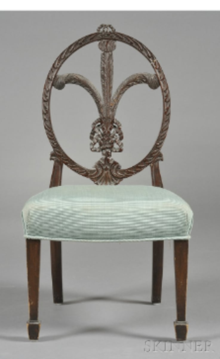 <p>Adam-style chair with backrest consisting of decorative carved or painted feathers.</p>