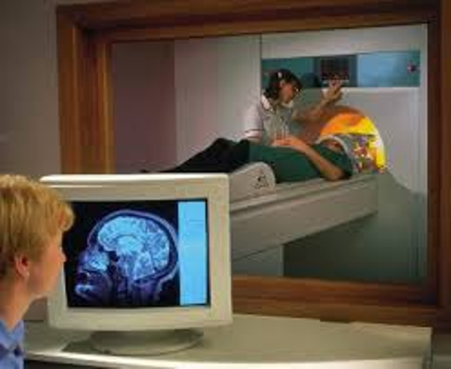 <p>a technique that uses magnetic fields and radio waves to produce computer-generated images of soft tissue. They scans show brain anatomy.</p>