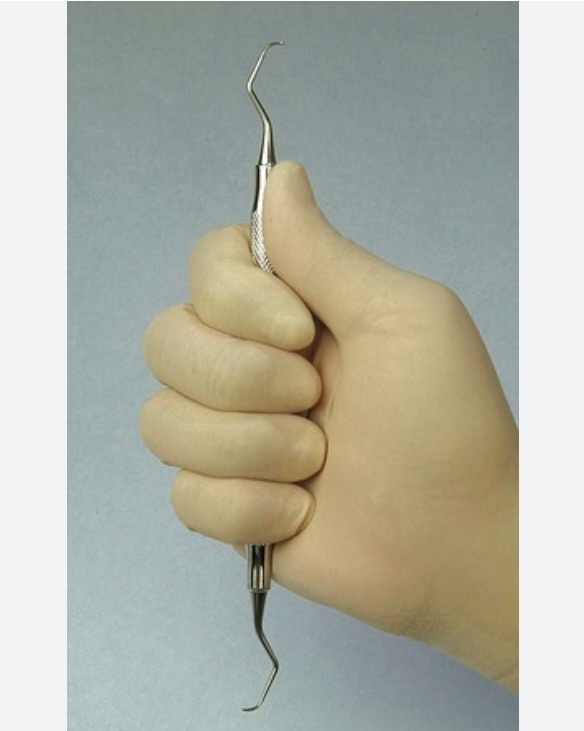 <p>instrument is held in palm of hand and the thumb is used to stabilize and guide the instrument</p>