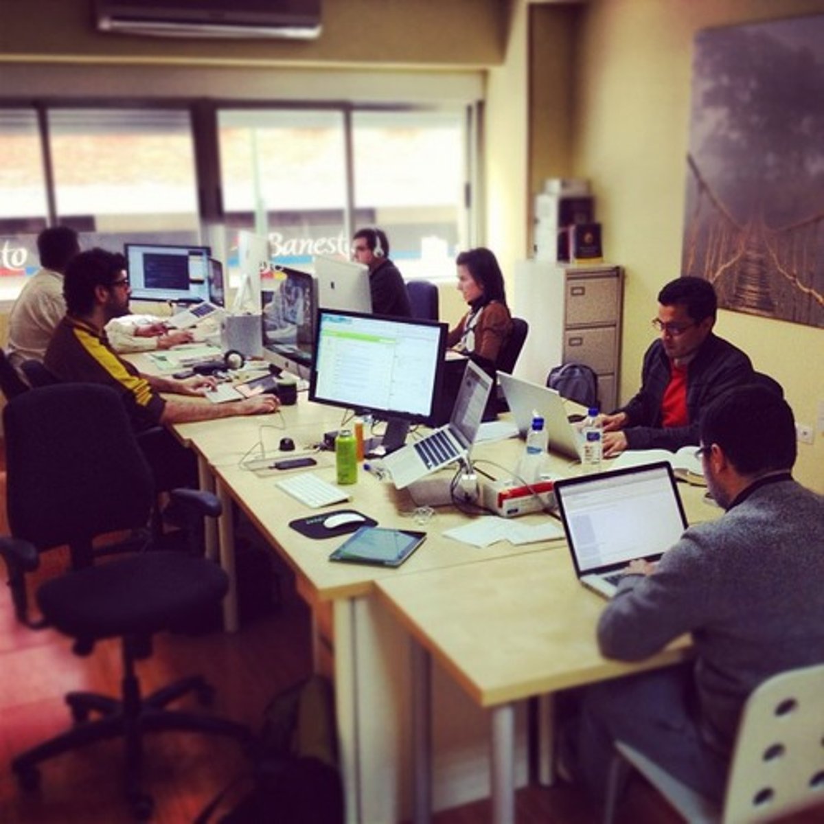 <p>World economic system characterized by a more flexible set of production practices in which goods are not mass produced; instead, production has been accelerated and dispersed around the globe by multinational companies that shift production, outsourcing it around the world and bringing places closer together in time and space than would have been imaginable at the beginning of the 20th century.</p>