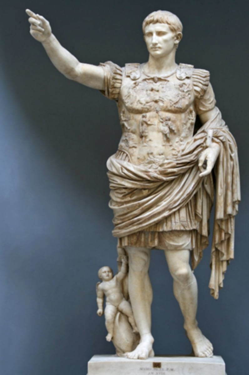 <p>DOC: 20 CE</p><p>ROO: Italy</p><p>M: marble (copy of bronze OG)</p><p>- propaganda art</p><p>- fig. highly idealized: physically+mentally (muscles + breastplate + judges robe)</p><p>- breastplate has imagery that shows gods on his side</p><p>- face has some infl. of verism</p><p>- contrapposto</p><p>- cupid+dolphin flank his right leg, show his divine descent from venus</p>