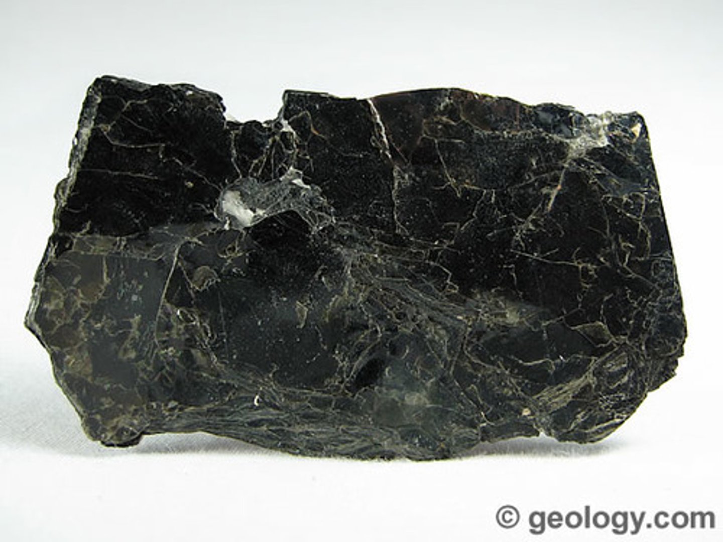 <p>dark brown to black mica, vitreous, glassy.</p>