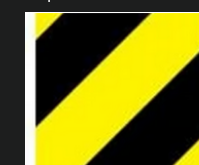 Regulatory sign: Hazard warning, lines are sloped to the left

\
