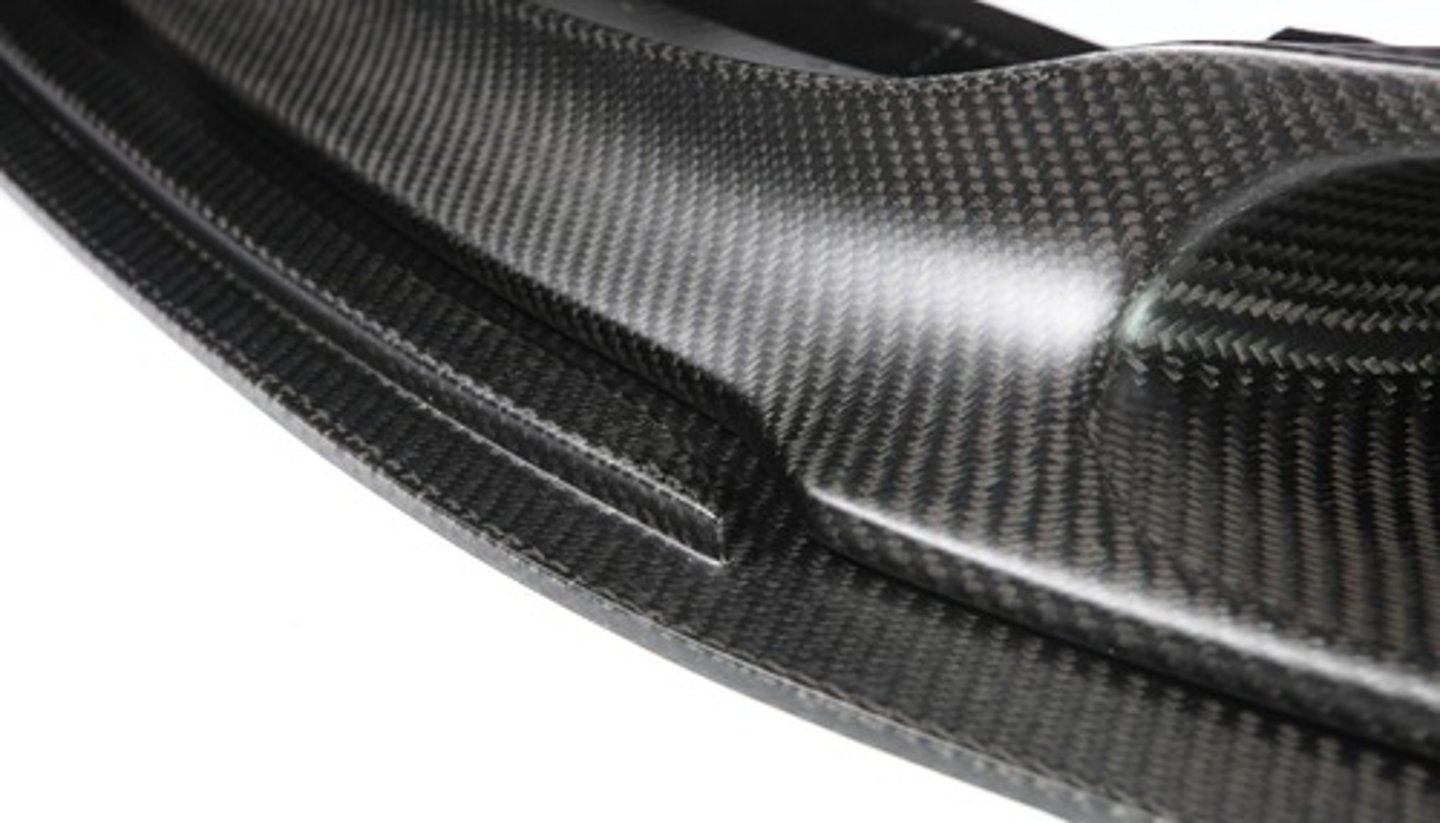 <p>A woven fabric made of carbon fibres and then impregnated with a resin to bond it together</p>