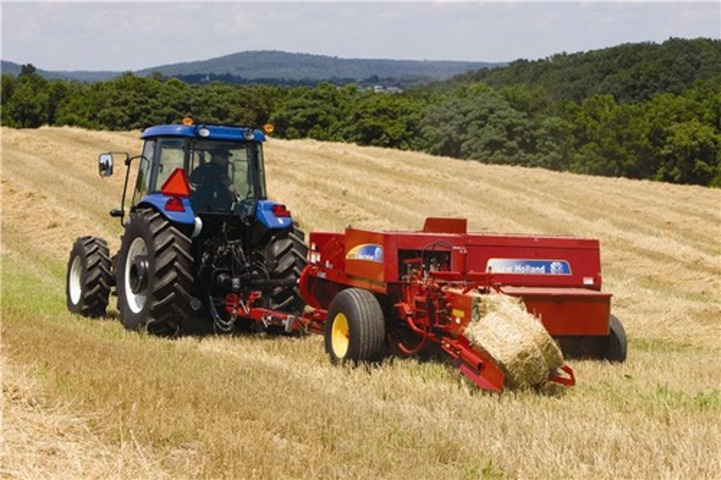 <p>Used to compress a cut and raked crop into square bales ( used on such crops as hay, cotton, flax, straw, etc..)</p>