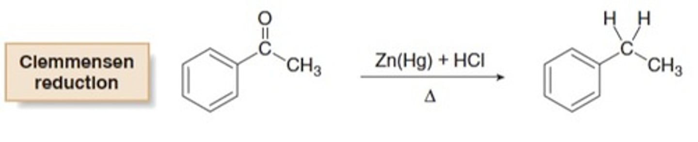 <p>A reaction in which a carbonyl group is completely reduced and replaced with a methylene (CH2) group</p><p>Zn(Hg)</p><p>---------></p><p>HCl, heat</p>