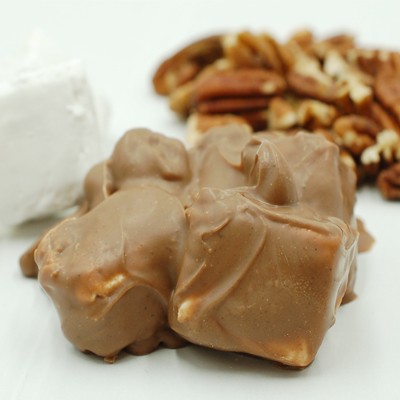 <p><span>Freshly made marshmallows and generous amounts of pecans are mixed in our milk chocolate and hazelnut praline paste.</span></p>