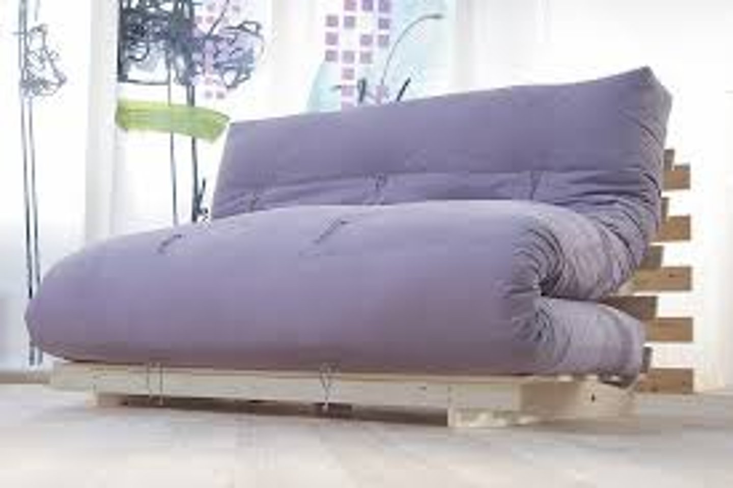 <p>A type of sofa that folds down into a bed.</p>