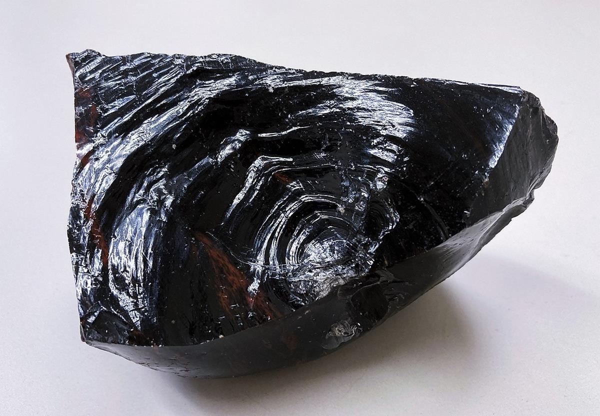 <p>Characteristic properties of igneous rocks include large crystals, __________, and many colors.</p>