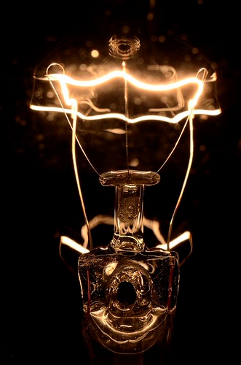 <p>Light generated by heating a piece of metal until it glows.</p>