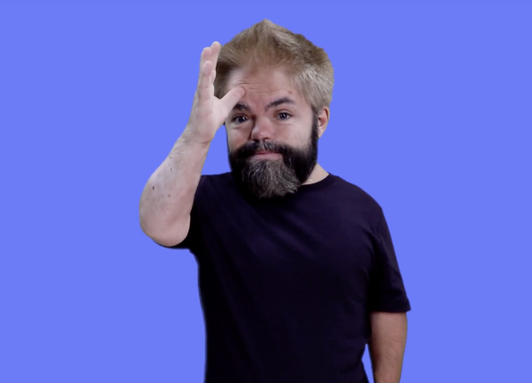 <p>Tap forehead with thumb twice</p>