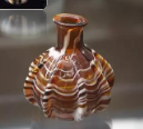 <ul><li><p>Roman Arts</p></li><li><p>Notable Glass Art</p></li><li><p>___, or perfume small bottles production were prevalent throughout the ancient Roman Empire, and from Egypt to Cologne, Germany.</p></li></ul><p></p>