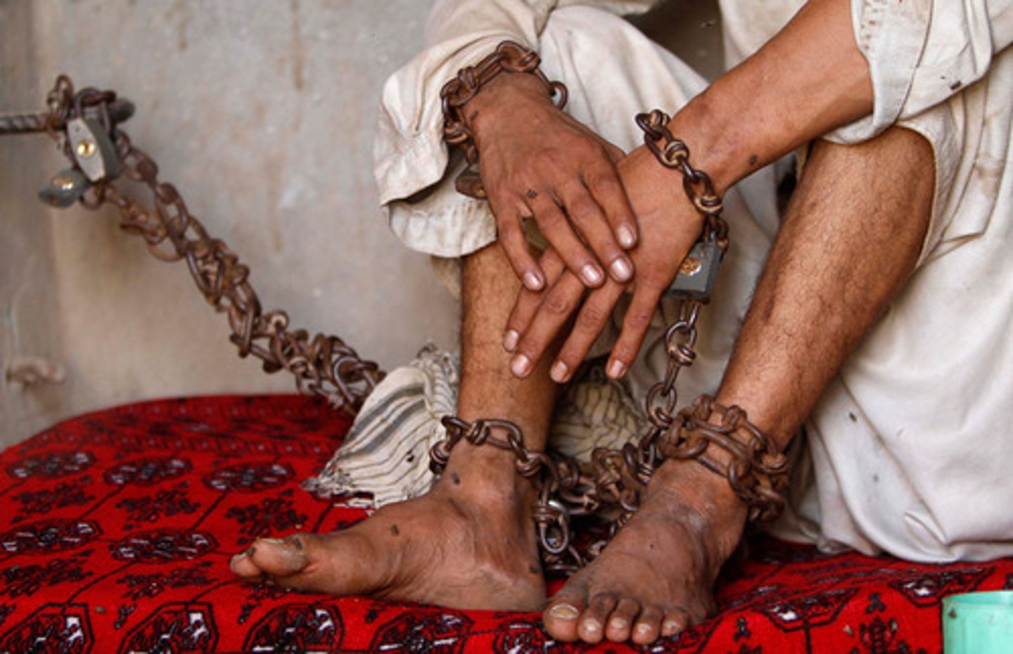 <p>(n.) a chain or shackle placed on the feet (often used in plural); anything that confines or restrains; <br>(v.) to chain or shackle; to render helpless or impotent<br><br>Synonyms: bond, restraint, bind, hamper <br>Antonyms: free, liberate, emancipate</p>