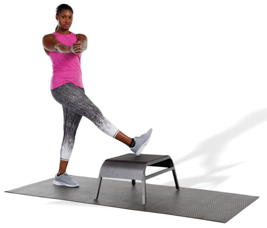 use a low box or step to perform this stretch

place one leg on top of the box in an adducted and internally rotated position

then, locking the hands together, slowly rotate the torso in the opposite direction

the stretched leg does not need to be elevated above hip height

this stretch emphasizes the lateral hamstring