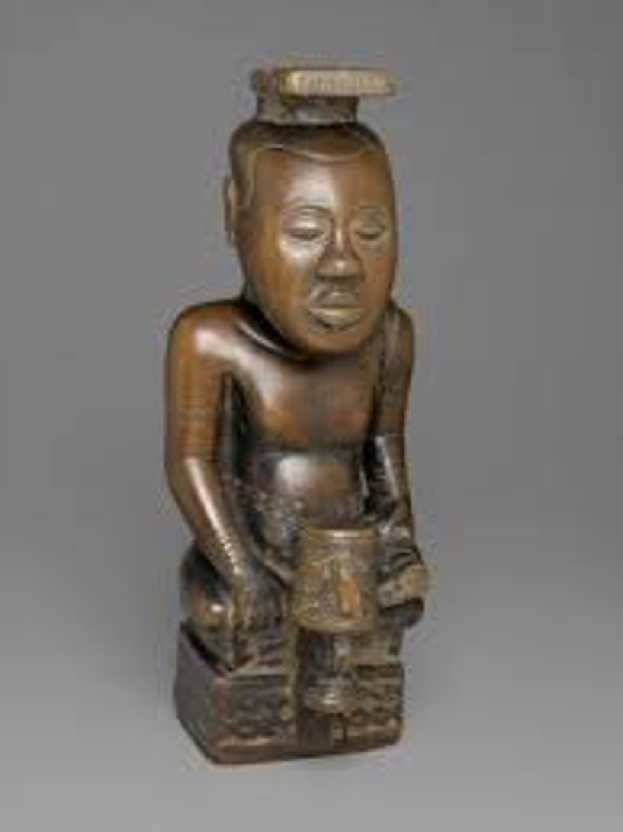 <p>Kuba people (CONGO!!), Wood<br><br>Kuba ruler in ideal state! Represents ruler, compliments ORAL TRADITION!! <br>Rulers ACCOMPLISHMENTS and VIRTUES!<br>Face is calm (beyond mortal shit)<br>Head is HUGE (so smart)<br>Each king gets one, secures place in history. Crosslegged on a stool with a peace knife! Really freaking old<br><br>NYIM= ruler<br>NDOP= portrait figure</p>