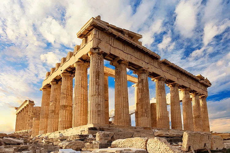 <p>located in athens, greece; can be entered in from anywhere</p><p>features include a fully columnated, single gabled roof with pediments on the front and back; has doric columns, of which are fluted and have block capitals</p>