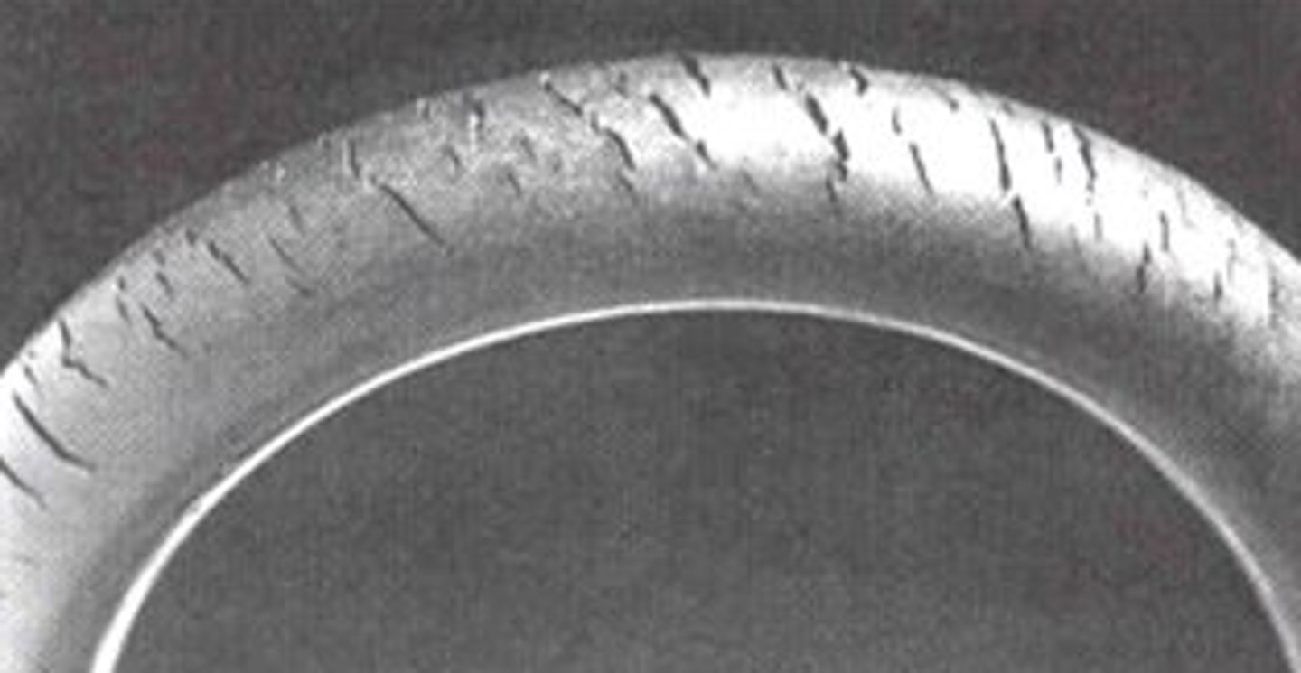 <p>traces of ozone in the atmosphere attack double bonds in the chains of the materials</p>