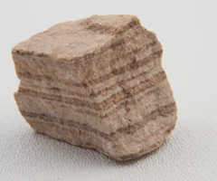 <p>sedimentary, dominant mineral is quartz. coarse-grained texture, sandy/rough surface, usually light color.</p>