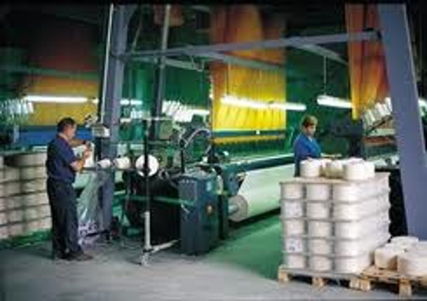 <p>the processing of raw materials into finished products; manufacturing</p>
