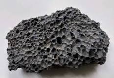 <p>Mafic, with a dark brown/red appearance. It is vesicular and porous due to air bubbles getting trapped in this rock while it cools. it looks like the volcanic rocks that you get in gardens.</p>