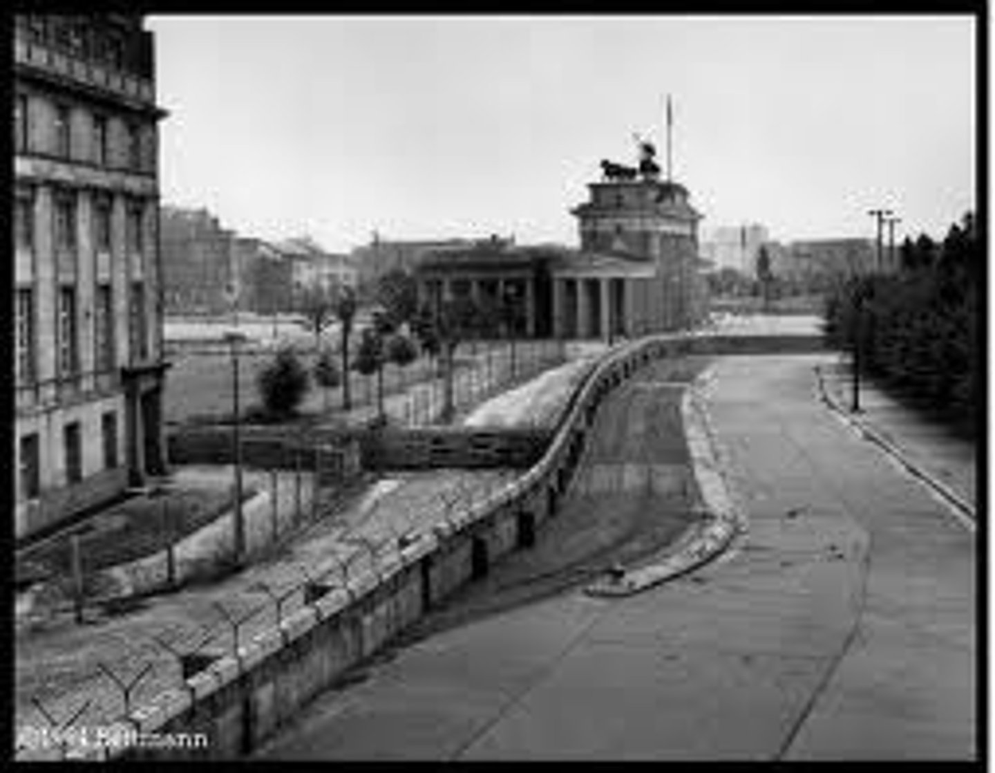 <p>The Soviet Union, under Nikita Khrushchev, erected a wall between East and West Berlin to keep people from fleeing from the East, afterwards Kennedy asked for an increase in defense funds to counter Soviet aggression.</p>