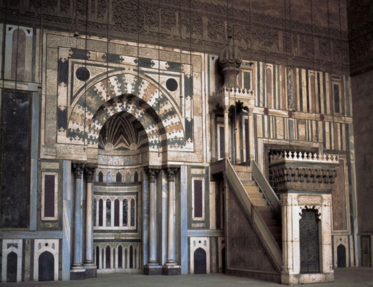 <p>The wall in a mosque that faces Mecca, indicating the direction Muslims face during prayer.</p>