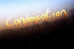 When the water vapour in the air cools it changes state into a liquid, forming tiny water droplets in the sky.